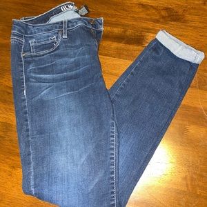 dark denim skinny jeans with distressed knees